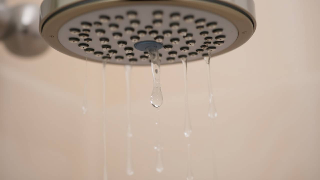 Dripping Water Droplets From Leaky Showerhead